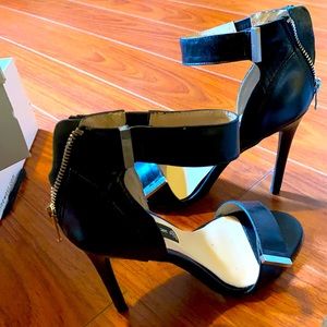 Steven by Steve Madden stylish & strappy heels.